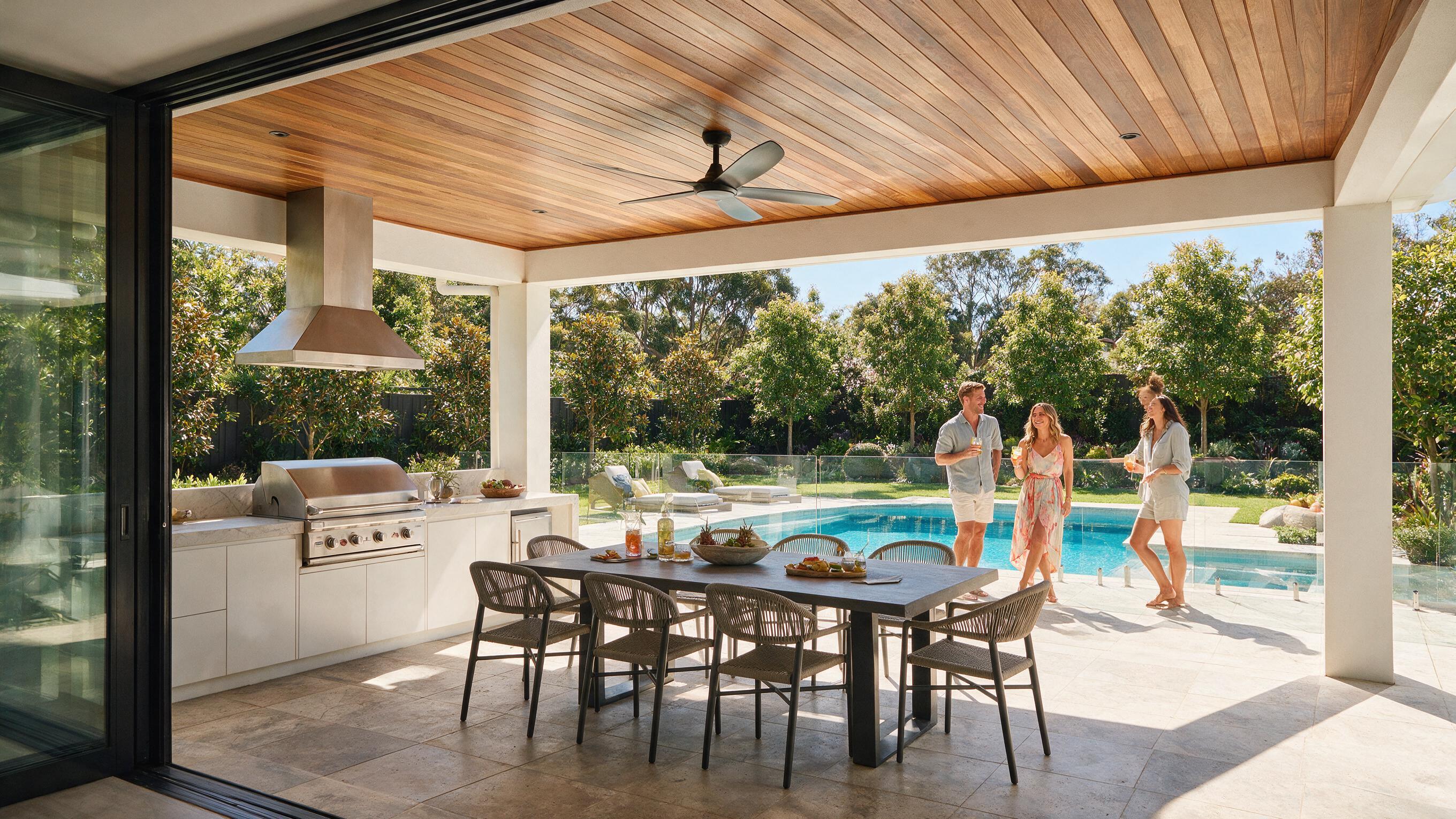Friends entertaining on a luxury outdoor terrace with a pool, AI lifestyle actors for real estate